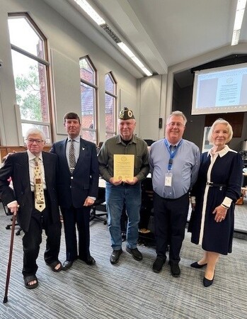 (from left to right) former Board member Ken Shepro, Veterans Anthony Catella and John Westphal, Board member Bill Roth and Board Chair Corinne Pierog