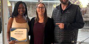 on the left Kezia Moore next to the woman she helped to save with CPR instructions along with the woman's husband