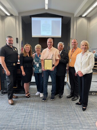 Kane County Sheriff Ron Hain, State's Attorney Jamie Mosser, Board Member Cherryl Strathmann, Steve McHugh, Board Members Mo Iqbal, Bill Tarver, Chairman Corinne Pierog