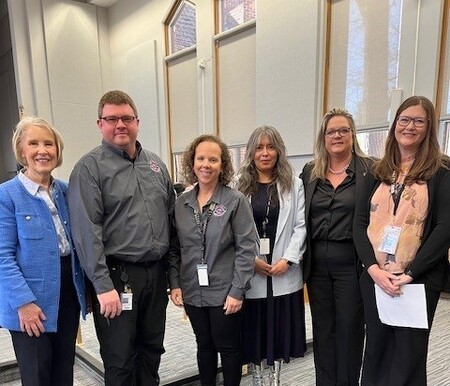 Memebers of Kane County's KaneComm Staff at the County Board meeting on April 8, 2025