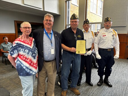 Board member Bill Roth with member of local Veterans organizations