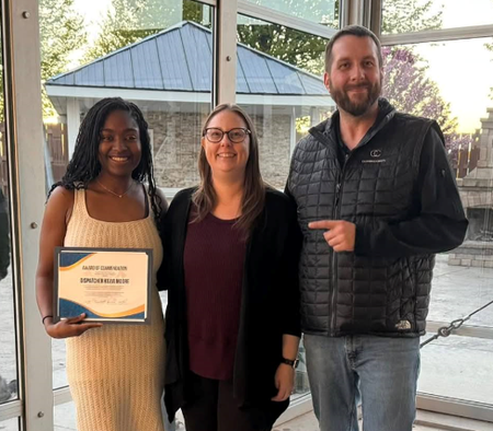on the left Kezia Moore next to the woman she helped to save with CPR instructions along with the woman's husband