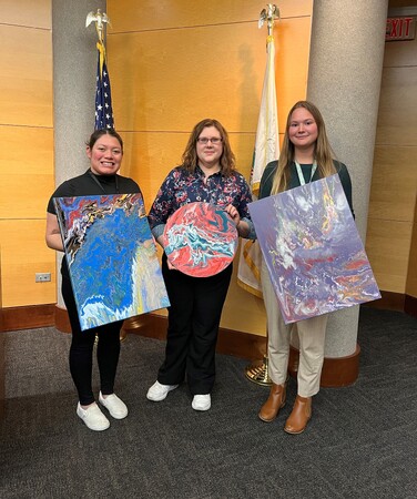 The Kane County Family Division Staff offering a painting activity to Treatment Court Participants 
