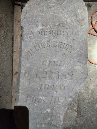 Headstone in the basement of the Third Street Courthouse that reads“Willie C. Cright… , died October 188"