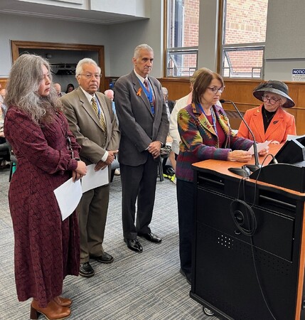 The proclamation was presented by a group of board members, including Mavis Bates, Deb Allan, Myrna Molina, Mo Iqbal, Ted Penesis, and Cherryl Fritz Strathmann.