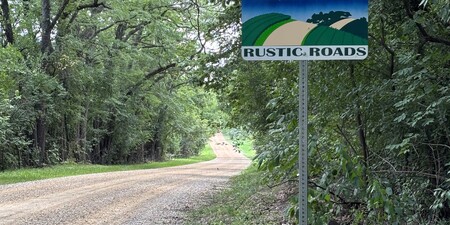 Near Elburn, Pouley Road is known for its dense tree canopy, rolling hills, Blackberry Creek, the historic Pouley Estate and scenic rural vistas.