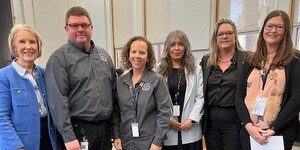 Memebers of Kane County's KaneComm Staff at the County Board meeting on April 8, 2025
