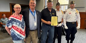 Board member Bill Roth with member of local Veterans organizations