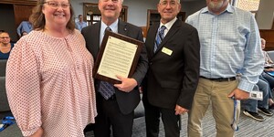 Tracy Erickson, Gary Erickson, Board Member Chris Kious, IT Executive Director Roger Fahnestock 