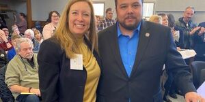 Kane County State's Attorney Jamie Mosser stands next to Purple Heart recipient Anthony Oritz, who was recently honored by the Kane County Board.