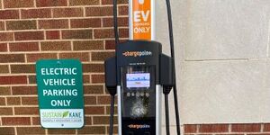 An electric vehicle (EV) charging station at the Kane County government center in Geneva.